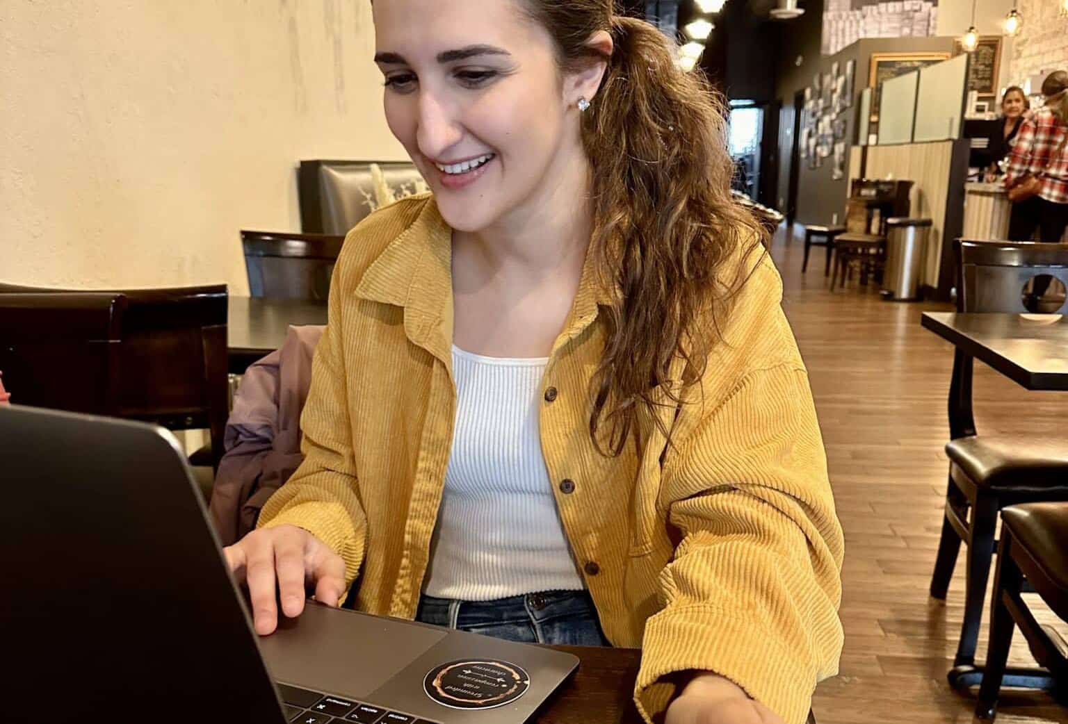 jamie graphic designer on laptop