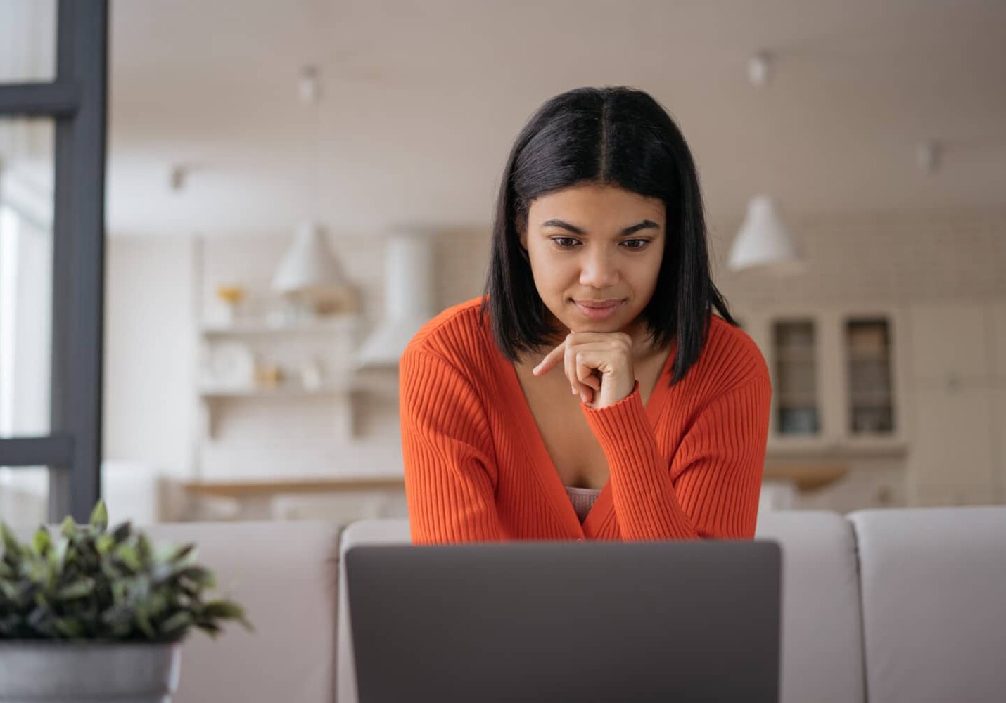 Young Woman Staring at Laptop Screen