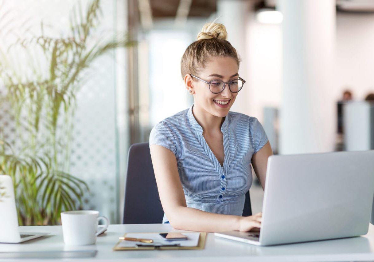 Savy Woman On Computer