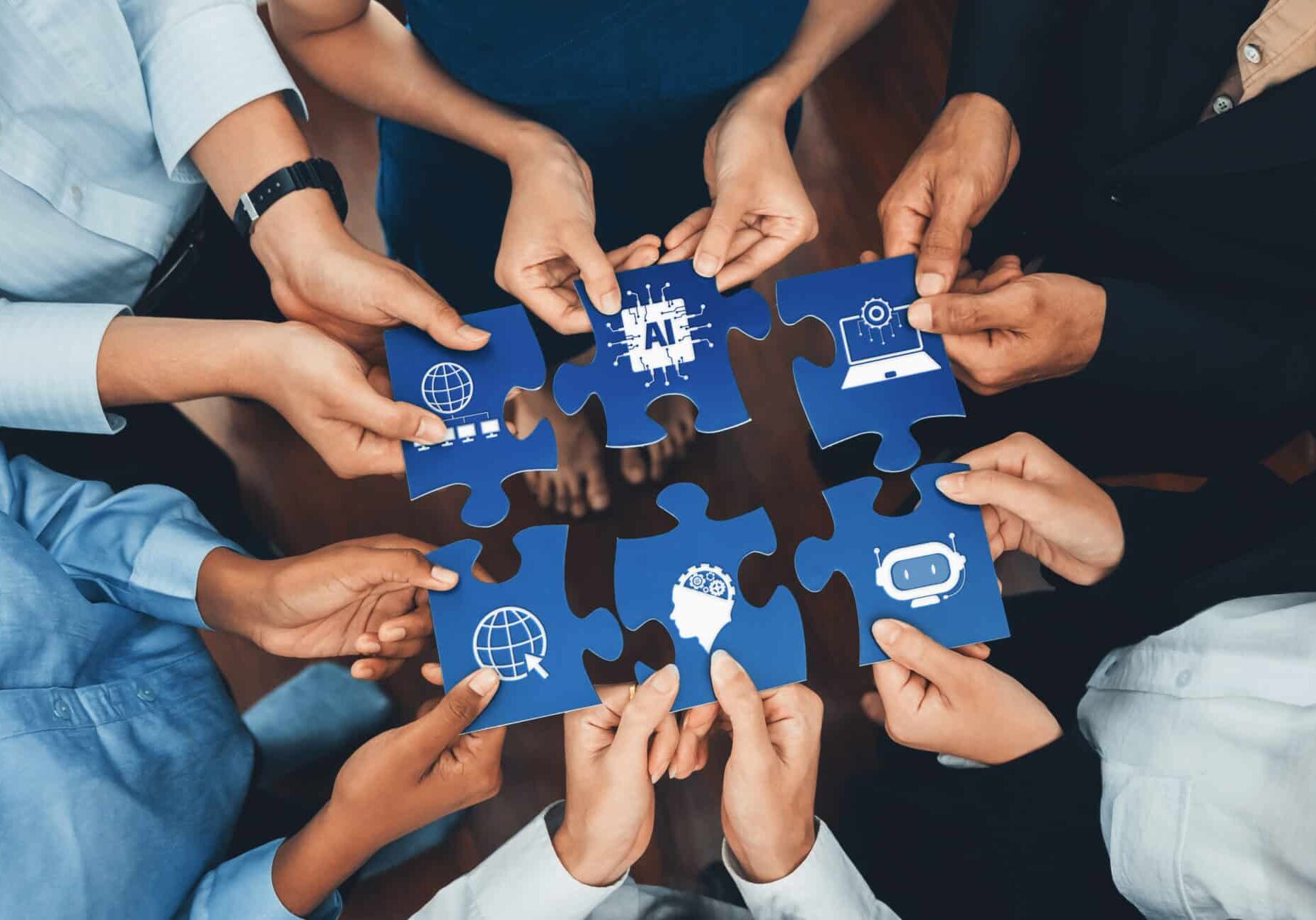 diverse hands collaborating on puzzle pieces symbolizing artificial intelligence, digital connectivity, and global innovations in a team environment. amity