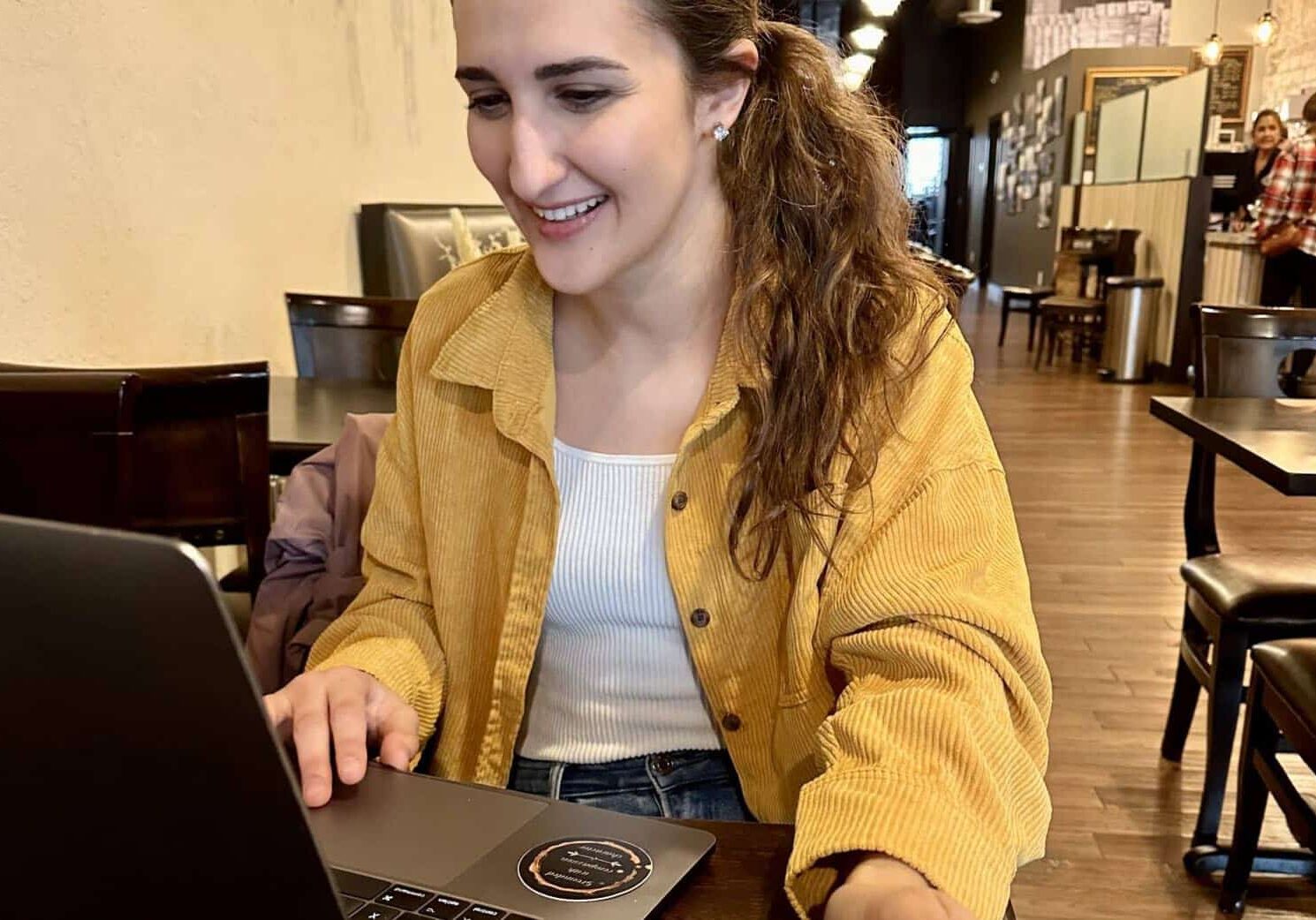 jamie graphic designer on laptop