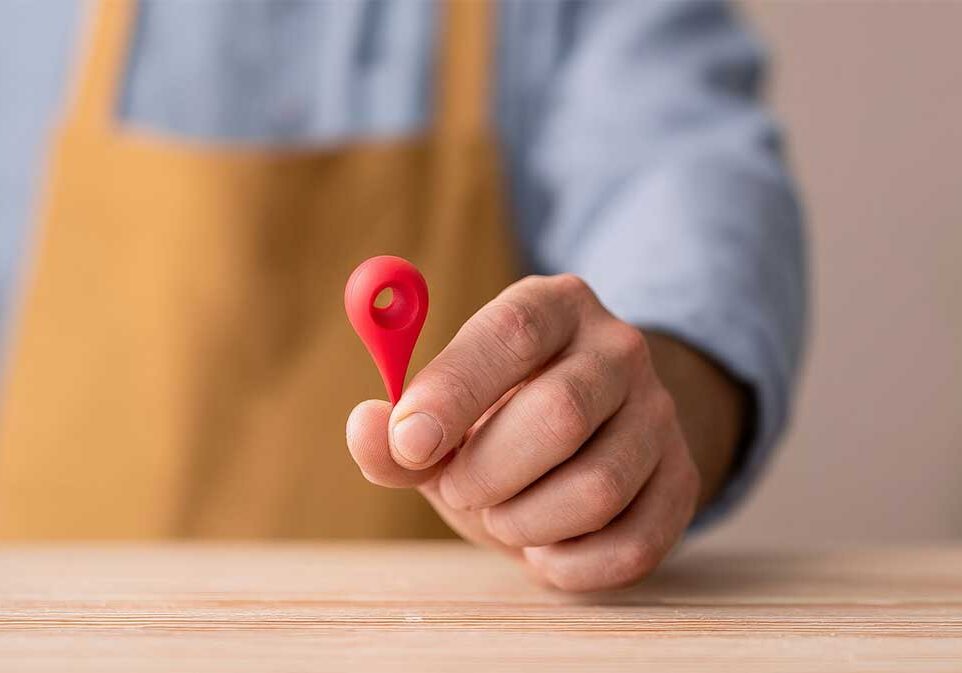 local business owner holding map icon