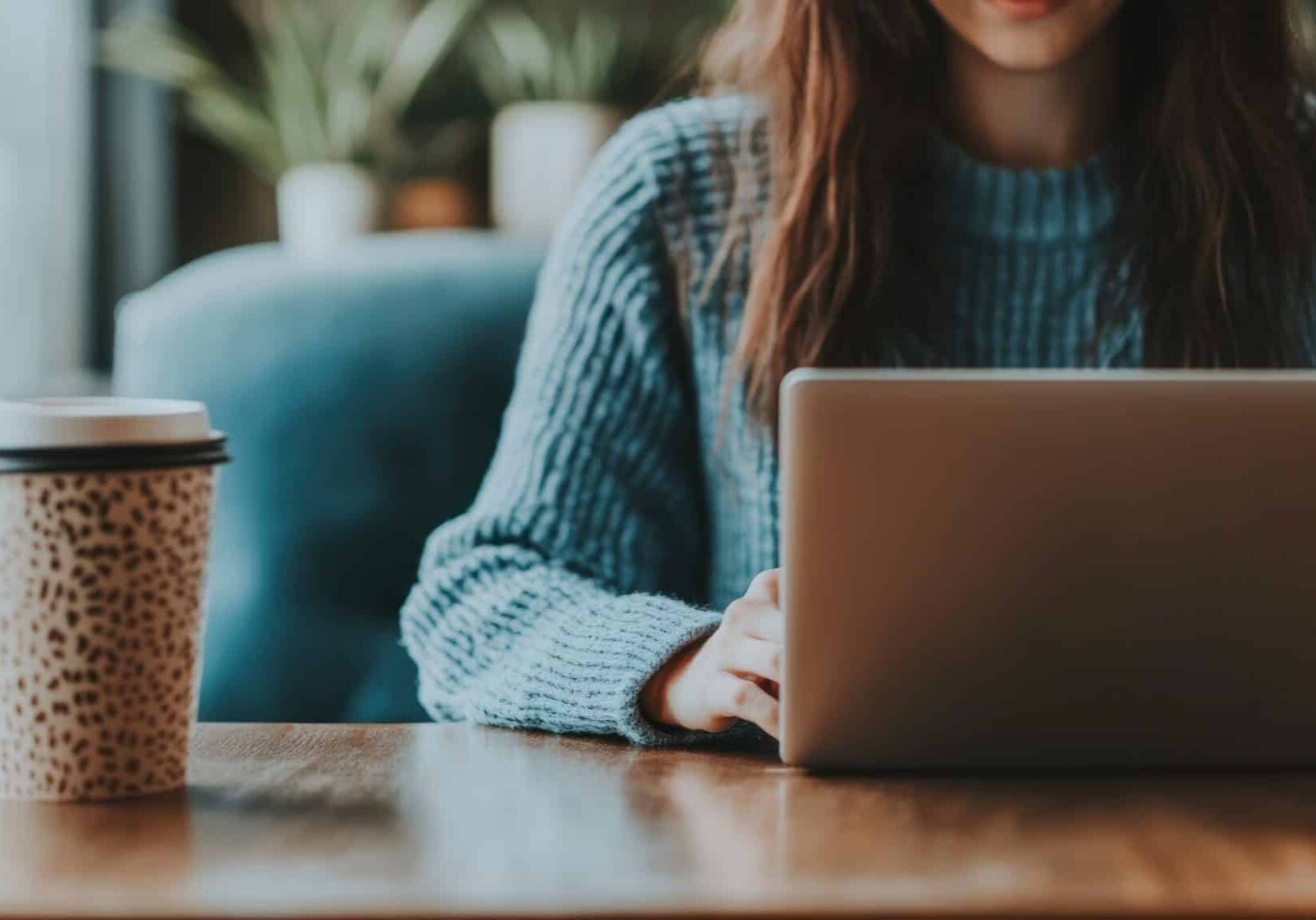 saleswoman engaged in digital content creation urban coffee shop cozy environment focused view productivity blend