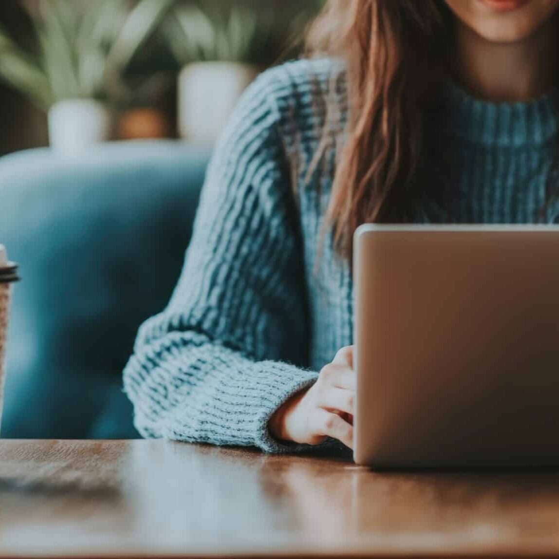 saleswoman engaged in digital content creation urban coffee shop cozy environment focused view productivity blend saleswoman engaged in digital content creation urban coffee shop cozy environment focused view productivity blend